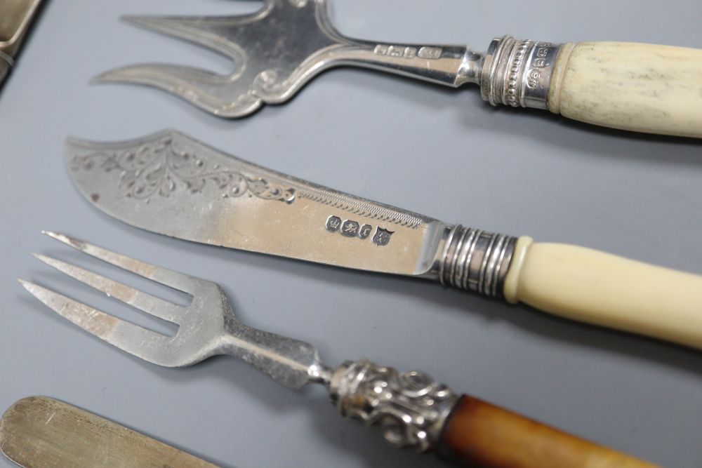 Nine assorted 19th century and later ivory handled silver knives and forks.